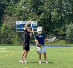 Over the Head Check lacrosse drill